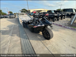 Auto transport service featuring a trike motorcycle being loaded on an enclosed trailer in Forney, TX.